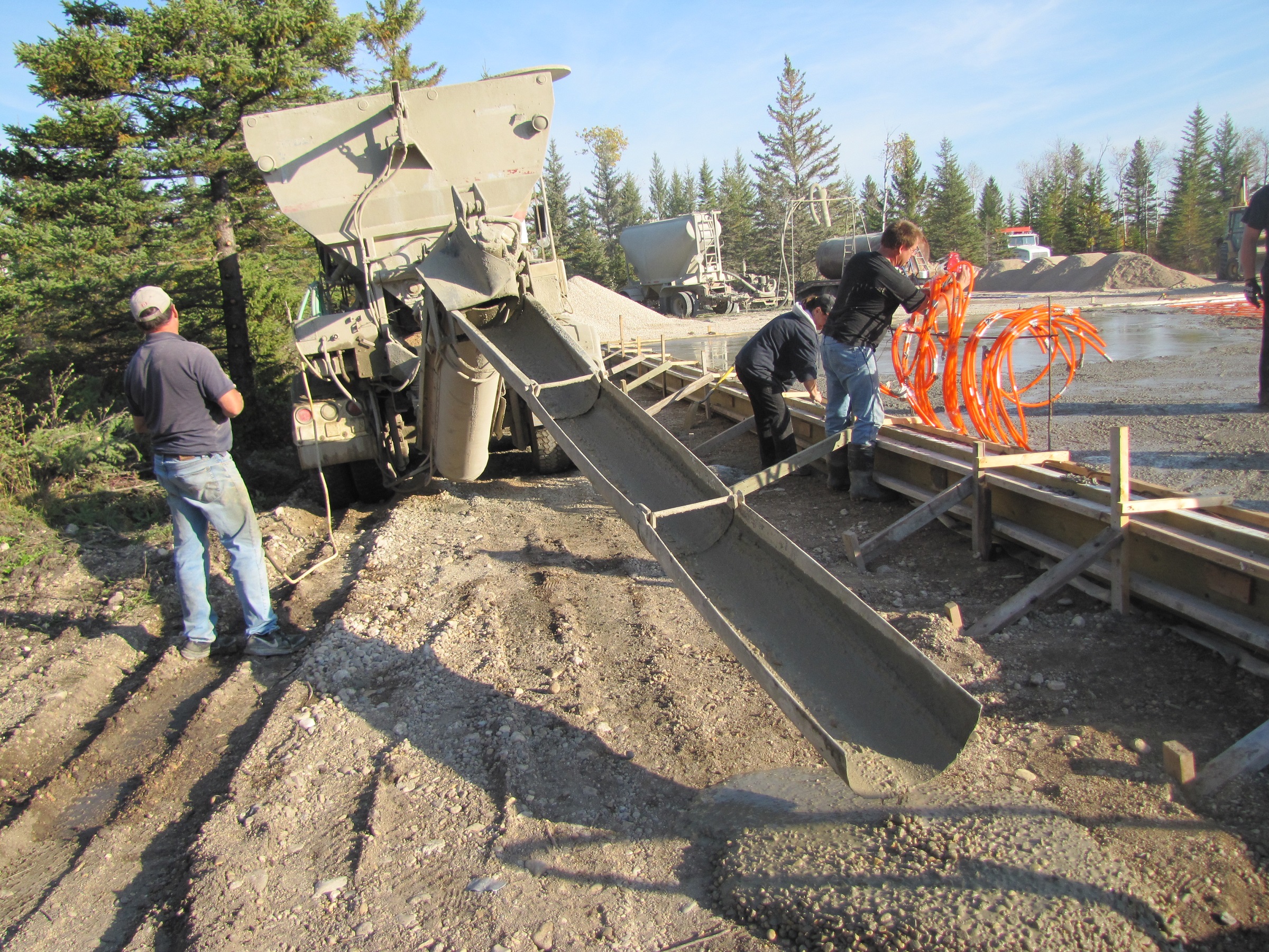 pouring concrete on job site